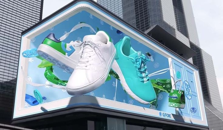 Storefront LED display showing sneaker product visuals on a building corner